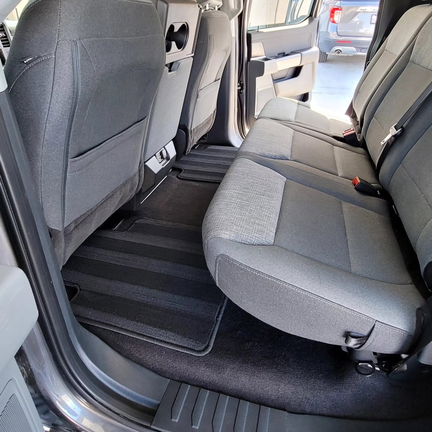 Clean car seat and vacuumed carpet after interior detailing in San Francisco